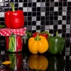 Paprika- und Erbsen Socken im Glas